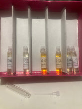 Load image into Gallery viewer, Most popular oil fragrance for her now comes in a 5 Ml sample dip stick bottles comes in a set of 5 different oil perfumes
