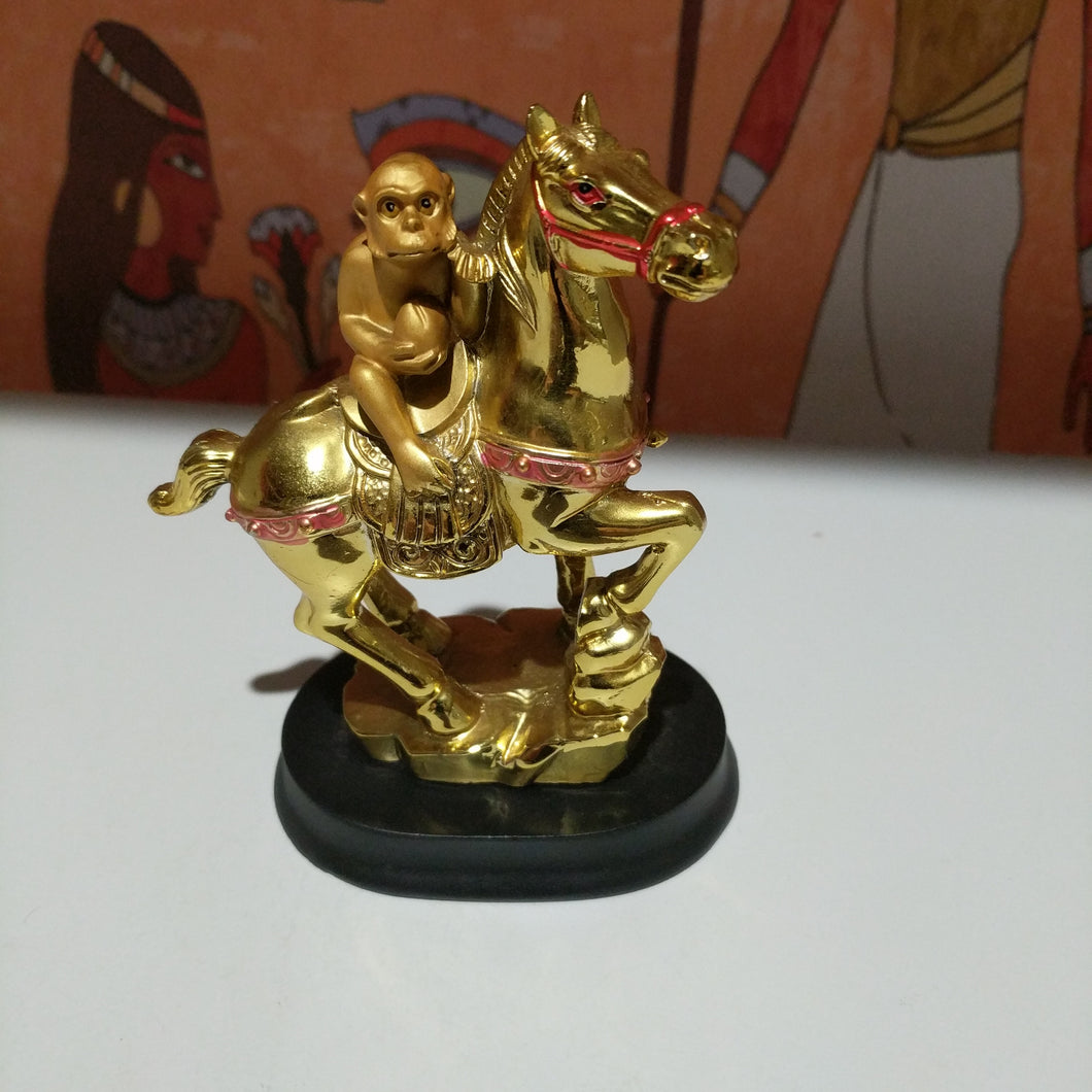 Egyptian collectable monkey on a horse