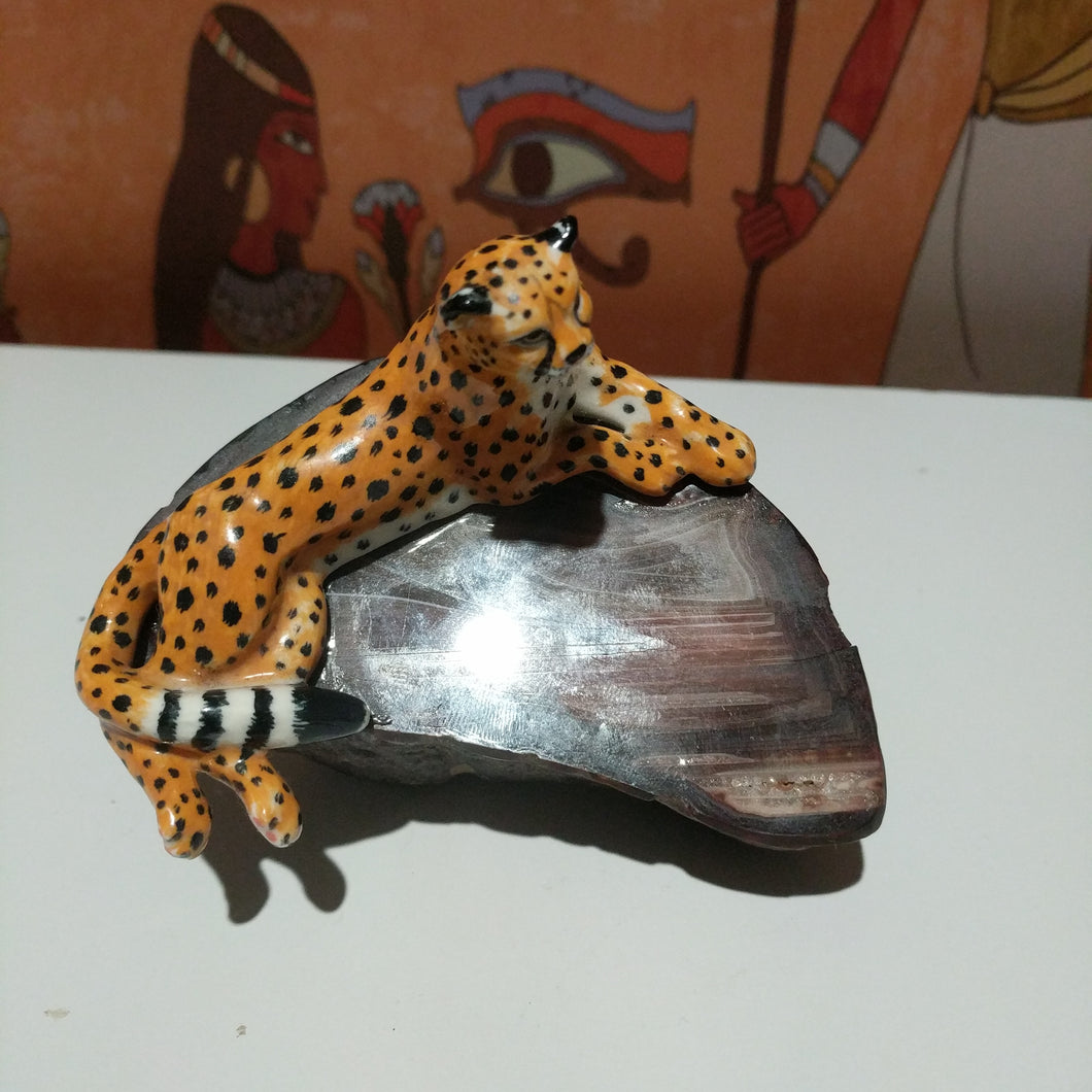 Collectable  wild cat on a natural stone